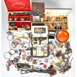 A collection of jewellery including glass beads, enamelled pieces, opal boulder pendant, Victorian