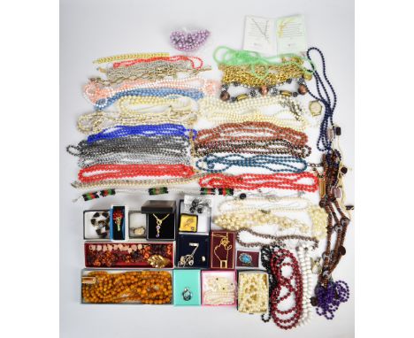 A collection of costume jewellery including beaded necklaces, pearl earrings, pheasant brooch, watch, Stratton compact, etc&n