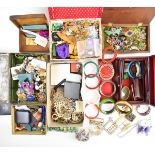 A collection of jewellery including vintage earrings, vintage brooches including Miracle, Siam