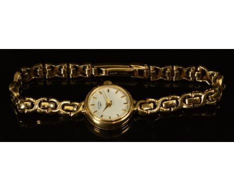 Rotary 9ct gold ladies wristwatch with gold hands and hour markers, white dial and quartz movement, on 9ct gold bracelet, cas