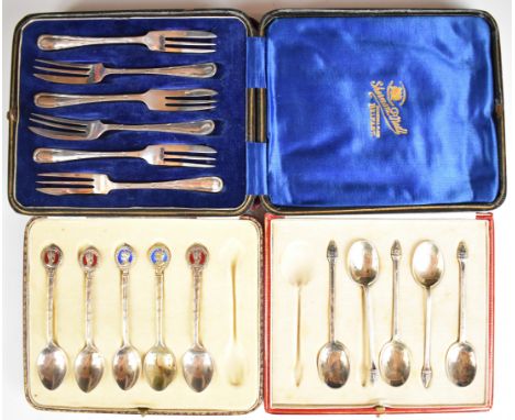 Three cased sets of hallmarked silver cutlery comprising set of six cake forks, part set of five Edward VII enamel decorated 