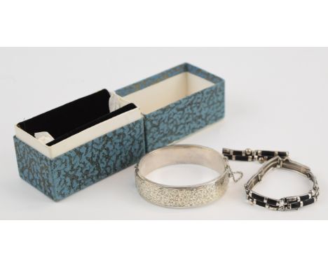 A hallmarked silver bangle and silver bracelet, 44g