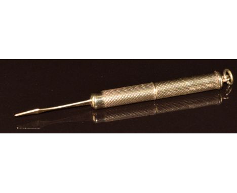 A 9ct gold toothpick with engine turned decoration, Birmingham 1979, 6g