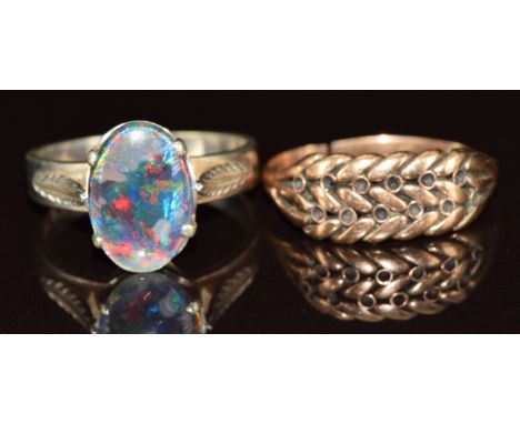 A 9k white gold ring set with an opal triplet and a 9ct gold keeper ring (both damaged), 5.4g
