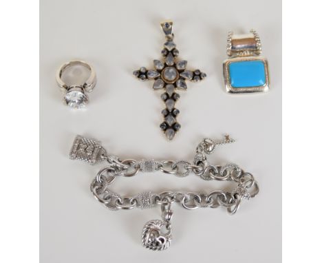 A silver ring with with cubic zirconia, two silver pendants and silver charm bracelet by Judith Ripka, 88g