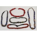 Five beaded necklaces including coral, glass, sodalite and millefiori, etc