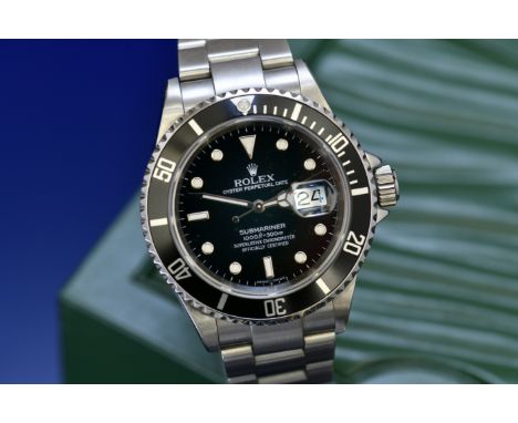 Rolex Oyster Perpetual Date Submariner gentleman's wristwatch ref. 16610 with date aperture, black dial and bezel, steel and 