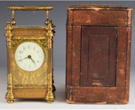 Late 19th or early 20th century gilt cased carriage clock with bevelled glass and fretwork decoration, marked to movement R&a