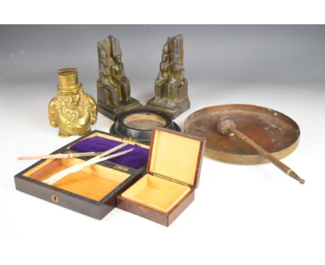 Collectables including Egyptian Grand Tour style bronzes, brass gong, Transvaal figural brass money box, treen boxes, pens et