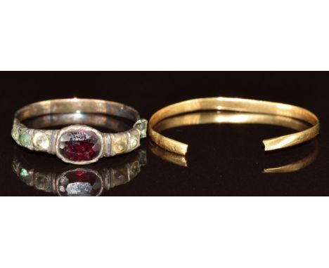 An 18ct gold wedding band (0.6g) and a Georgian ring set with a foiled garnet and paste (both damaged)