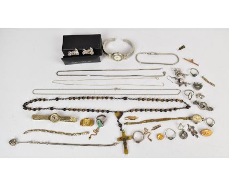 A collection of jewellery including silver ring set with turquoise, silver bracelet, silver chains, silver ring mounts, yello