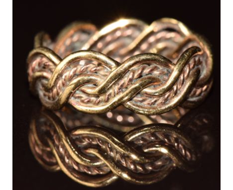 A 9ct 'lovers weave' Cymru Welsh gold ring with original box and paperwork, 2.6g, size H