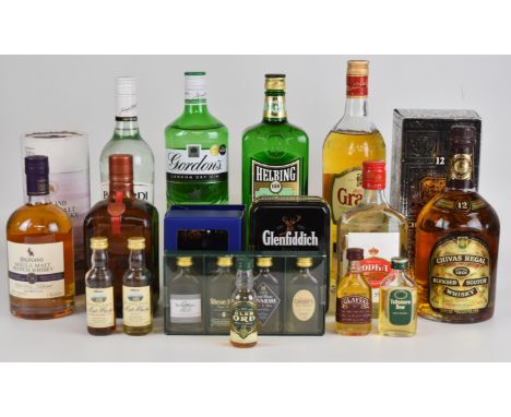 A collection of mixed spirits and liqueurs to include Chivas Regal, Bacardi, Cointreau, Gordon's Gin and Grant's whisky.PLEAS