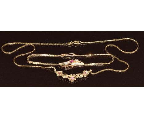 A 9ct gold necklace set with rubies (4.2g, 44cm) and a 14k gold bracelet set with a ruby and paste (3.9g, 18cm