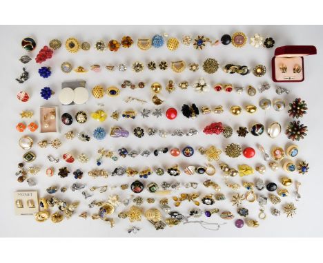 Sixty-five pairs of vintage earrings including Trifari, Monet, Ciro, Carolina Herrera, Joan Rivers, Craft, Ivana, etc and som