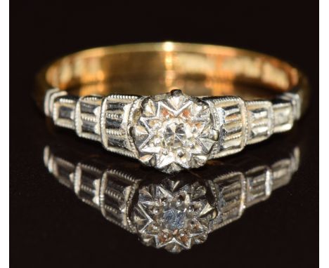 An 18ct gold ring set with a diamond in a tiered platinum setting, 2g, size K