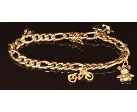 A 9ct gold charm bracelet with four 9ct gold charms including bike, hope, faith and love, teddy bear and a pair of shoes, 14.