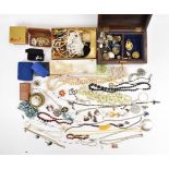 A collection of costume jewellery including beads, mother of pearl earrings, vintage brooches, fresh