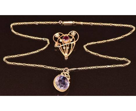 A 9ct gold chain with barrel clasp and two Edwardian&nbsp;9ct gold&nbsp;pendants, one set with an oval amethyst (Birmingham 1