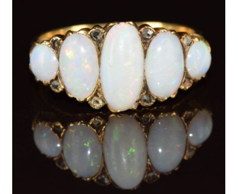 An 18ct gold ring set with five oval opal cabochons and rose cut diamonds, Birmingham 1921, 4.8g, size N