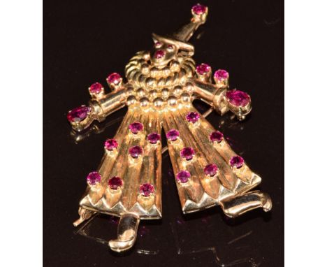 An 18ct gold brooch in the form of a clown set with round and pear cut rubies, the largest pear cut ruby approximately 0.3ct,