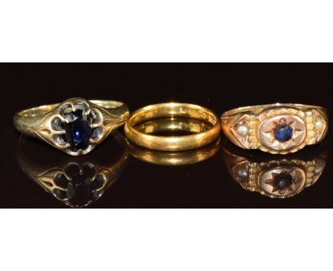 A 9ct gold ring set with paste and seed pearls (1.7g, size P, Chester 1893), yellow metal ring set with a sapphire (3.3g, siz