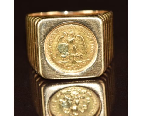 A 14k gold ring set with a gold coin, 11.4g, size R