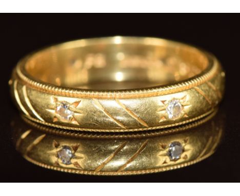 An 18ct gold eternity ring set with diamonds, 4.3g, size K