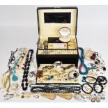 A collection of jewellery including vintage earrings, silver earrings, two silver rings, and a