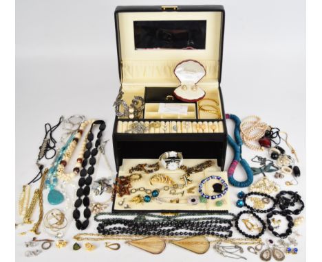 A collection of jewellery including vintage earrings, silver earrings, two silver rings, and a silver bracelet, tiger's eye b