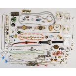 A collection of jewellery including Stradlings Cirencester watch, quartz beads, silver chain,