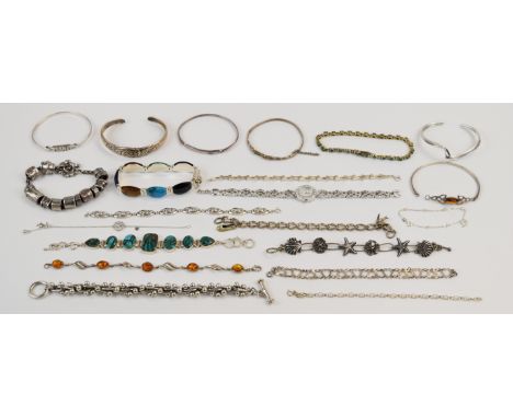 Six silver bangles, thirteen silver bracelets including turquoise, emerald, etc, Danon charm bracelet and a silver watch&nbsp