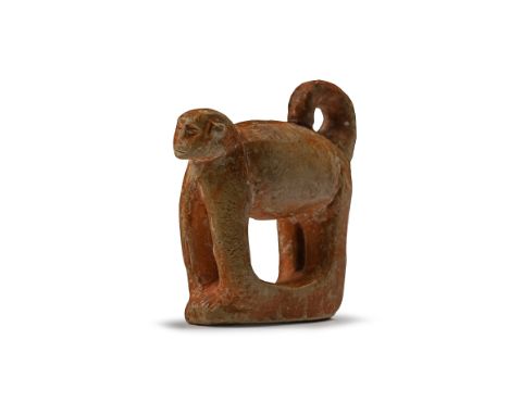 Ptolemaic Period, 4th-1st century B.C. or later Standing on a rectangular plinth with head raised and tail curled above the h