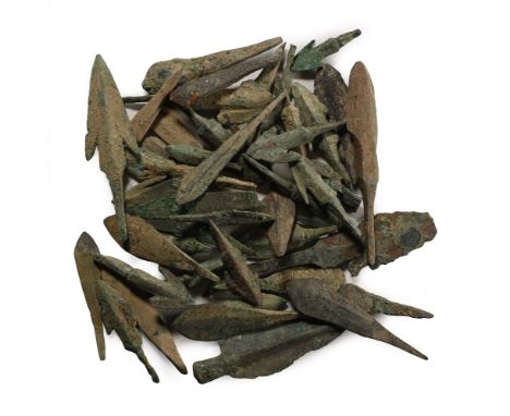 18th-3rd century B.C. Comprising triangular types with thick midrib, heater-shaped, leaf-shaped, barbed-and-tanged, paddle-sh