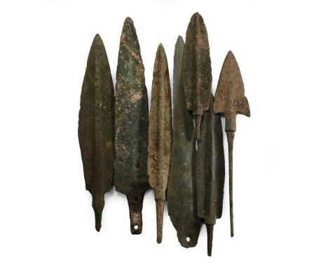 1800-700 B.C. Including mainly triangular and leaf-shaped types of arrowheads, and two small daggers with pierced tang. See M