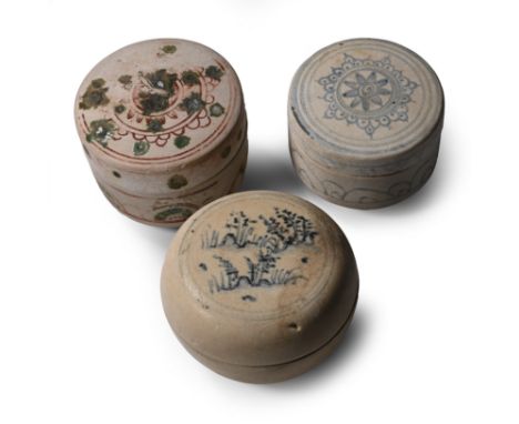 15th century A.D. Comprising three powder boxes, one with a landscape to the lid; one with a central floral motif and two dec
