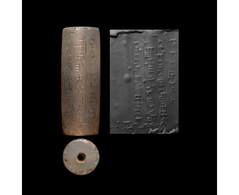 9th-7th century B.C. Carved with five columns of cuneiform inscription: 'To the god Samnuha, great lord, Samsanu, eunuch, for