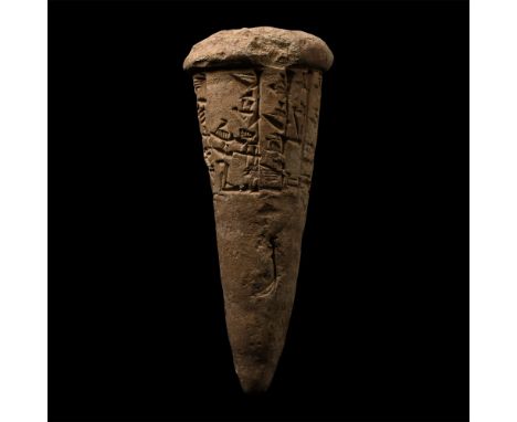 Circa 2100 B.C. Conical with a domed top, ten-line inscription for Gudea of Lagash, giving a record of the building of Eninnu