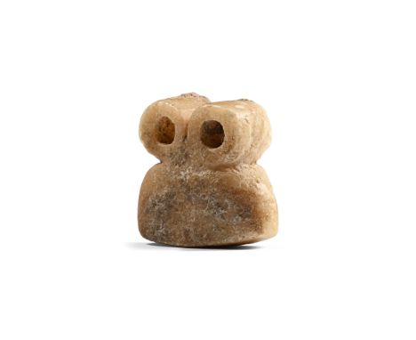 4th-3rd millennium B.C. With a squat body and two looped eyes, slightly convex base. See parallel idols in the Louvre Museum,