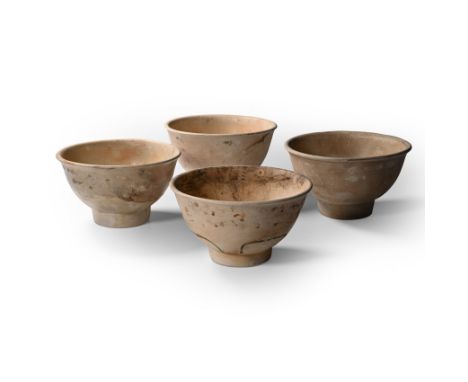15th century A.D. Comprising four bell-shaped bowls with remains of painted polychrome designs to the outer faces. Cf. The Ba