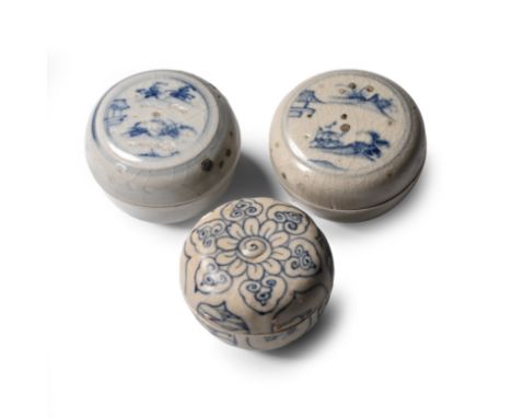 15th century A.D. Comprising three powder boxes, two with a painted landscape showing a corner of a building to the side; one
