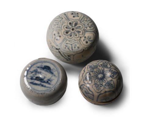 15th century A.D. Comprising three powder boxes, two with painted floral motifs and one with a landscape to the lid. Cf. Chun