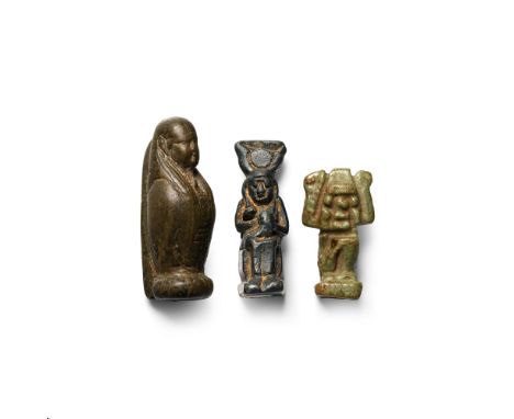 Late Period-Roman Period, circa 664 B.C.-100 A.D. Comprising: a seated figure of Isis suckling infant Horus on her lap, the g