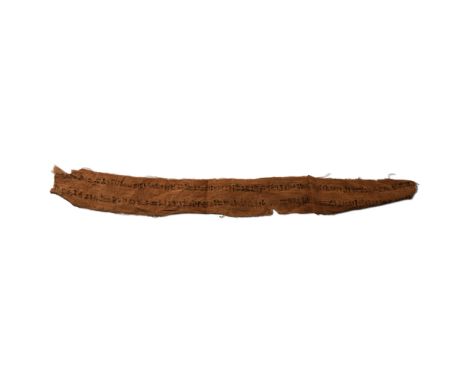 Late-Ptolemaic Period, circa 480-30 B.C. A narrow strip of woven linen textile featuring two lines of neatly written hieratic