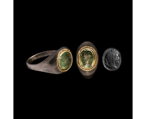 2nd-3rd century A.D. With the bust of the emperor facing left, laurel wreath in his curly hair with ribbons falling behind hi