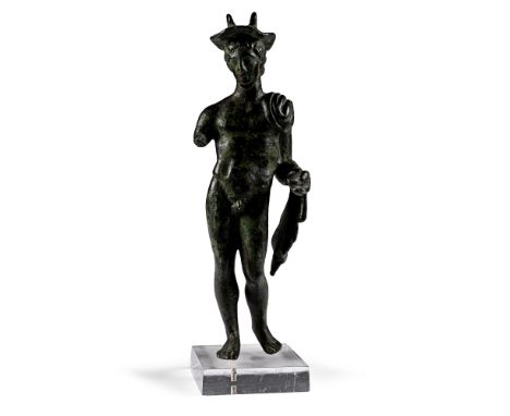 1st century A.D. A youthful and muscular figure of the god Mercury (Greek Hermes) standing nude with his weight resting on hi
