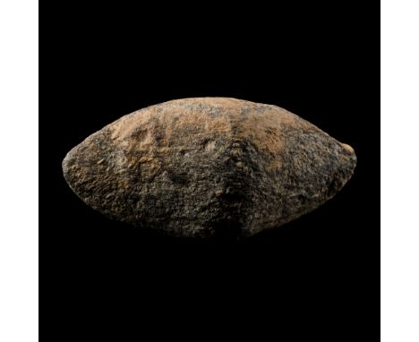45 B.C. A biconical facetted lentoid-section lead sling shot (glans), inscription monogram a combination of letters 'C', 'A' 