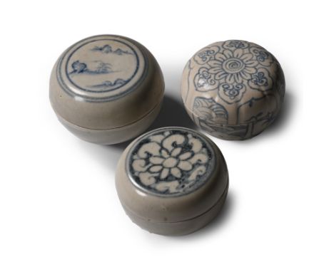 15th century A.D. Comprising three powder boxes, two with painted floral motifs, one showing a landscape within a double bord