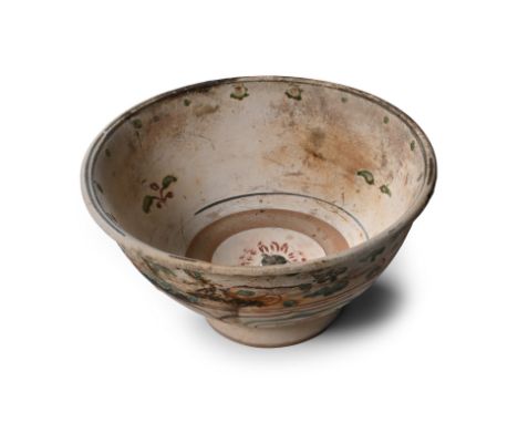 15th century A.D. A polychrome bell-shaped bowl with floral motifs and tendrils to the inner and outer face. Cf. Bach, N., Vi