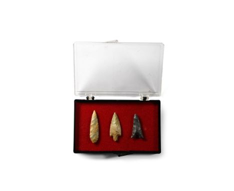 Neolithic Period, circa 6000 B.P. Group of three flint arrowheads comprising leaf-shaped, triangular and chevron. Published o